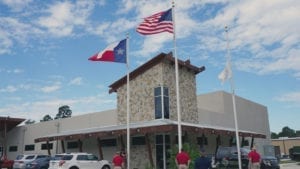 Saddle River Range facility in The Woodlands Texas raises Texas and American Flags in Honor of Veterans Day